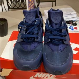 One pair of Nike Air Huaraches sneakers